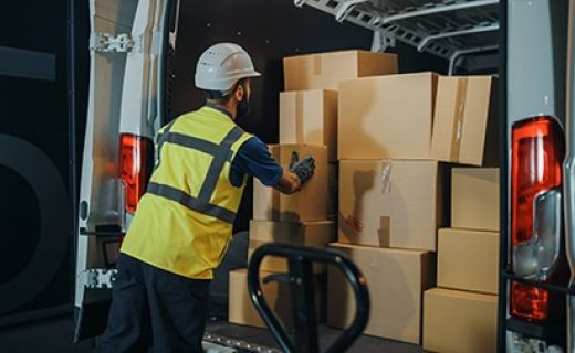 Handsome,Latin,Male,Worker,Wearing,Hard,Hat,Loads,Cardboard,Boxes Handsome Latin Male Worker Wearing Hard Hat Loads Cardboard Boxes into Delivery Truck. Delivering Online Orders, E-Commerce Goods, Food, Medicine Supply. Overworked Tired Frontline Hero Doing Job